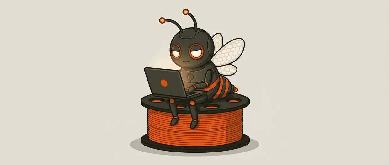 Ari, the Additive Architect assistant, a small robotic bee, sitting on a spool of orange filament working on a laptop